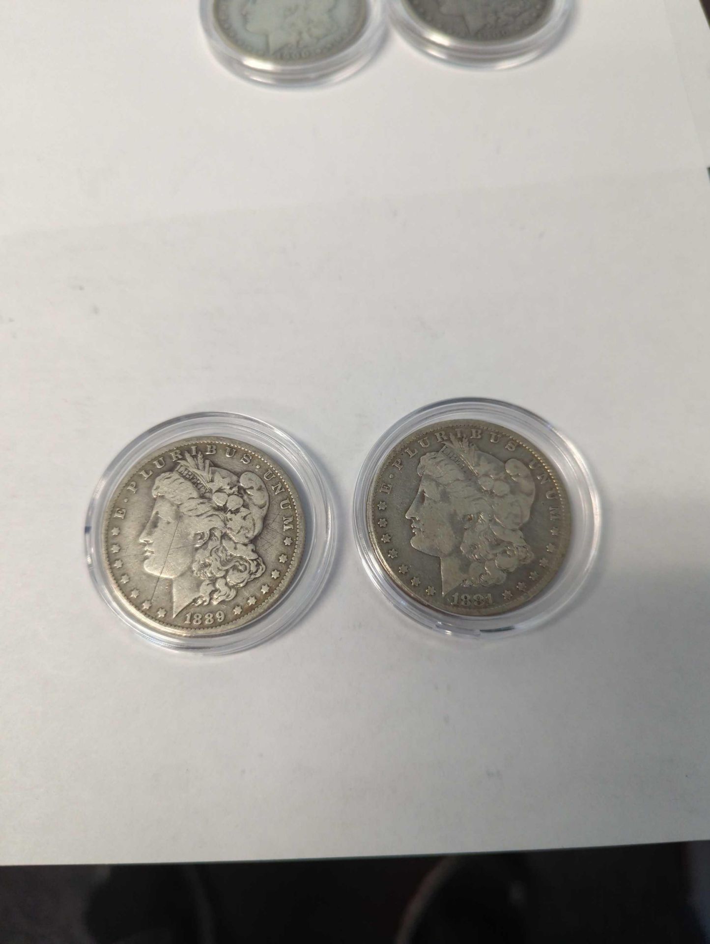 1889 and 1881 Morgan Dollar