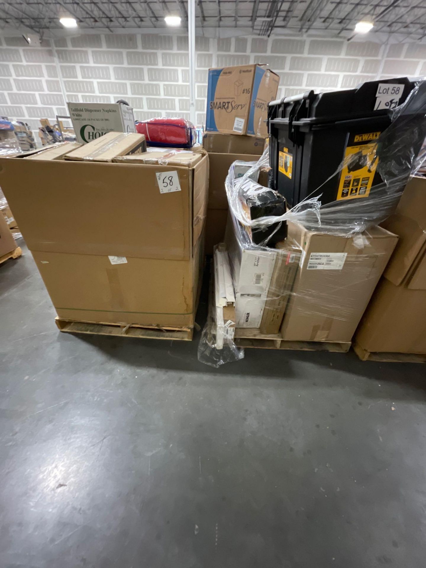 two pallets DeWalt tuft chest Kohler product HomeGoods even flow paper products and more