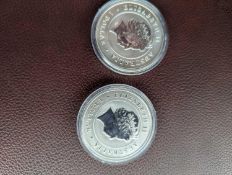 2 spider silver coins