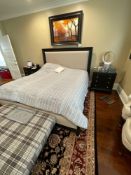 king bed with two matching nightstands and chest of drawers