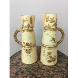 Pair Royal Worcester ewers, with marks to the base in puce and green