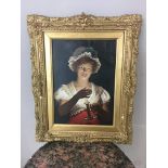 19th c oil on canvas of lady and a candle, unsigned in ornate gilt mirror, tear to the top right of
