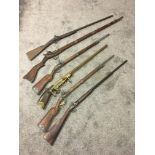 Six vintage Wall piece Spanish flintlock copy rifles.