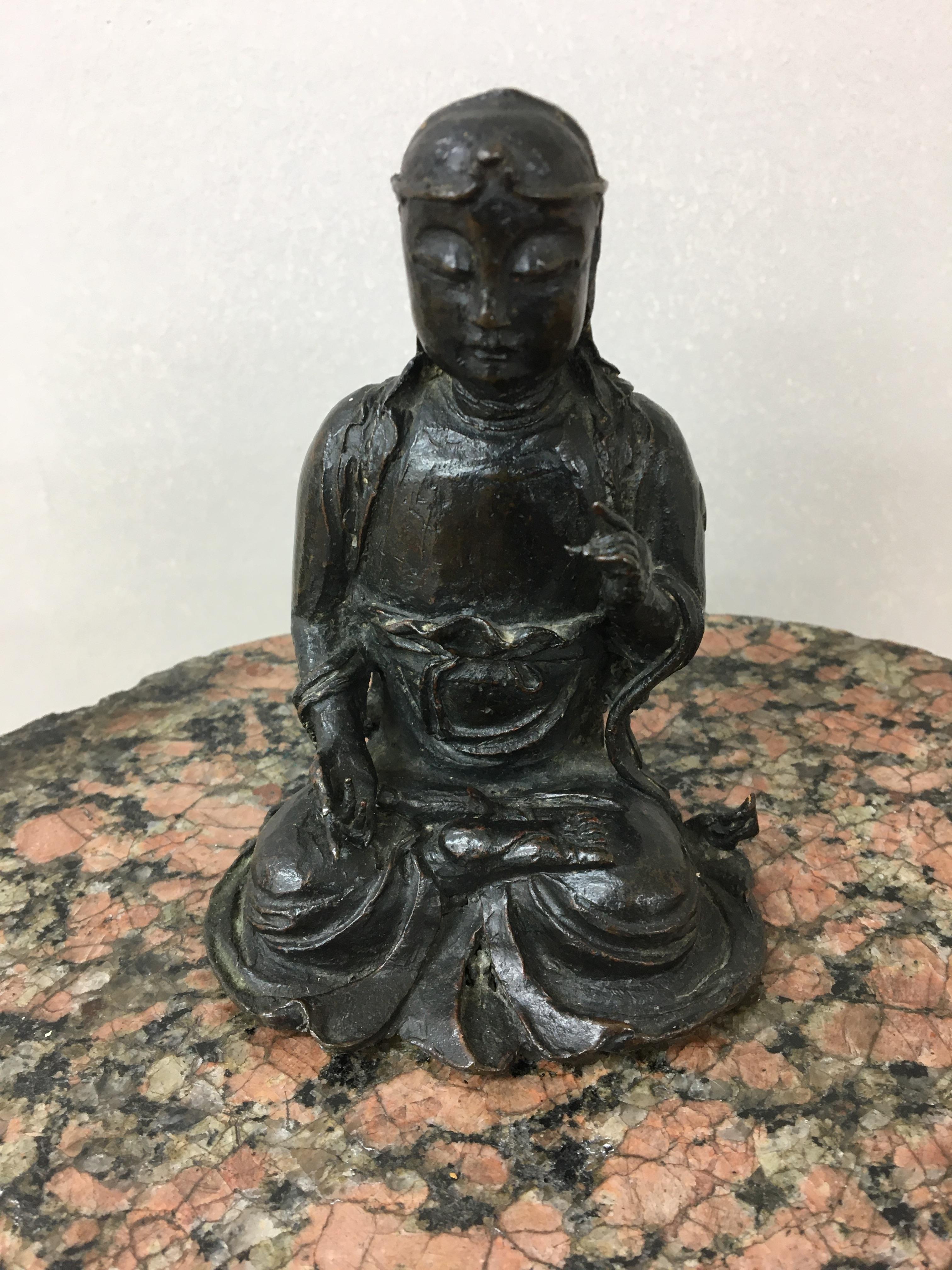 19th c Bronze chinese figure of a meditating scholar sat in the lotus position lead filled at a late