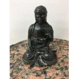 19th c Bronze chinese figure of a meditating scholar sat in the lotus position lead filled at a late