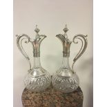 Pair of 19th c claret jugs with squeeze handles to