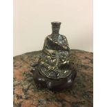 HM Silver figure of a seated oriental man with pig