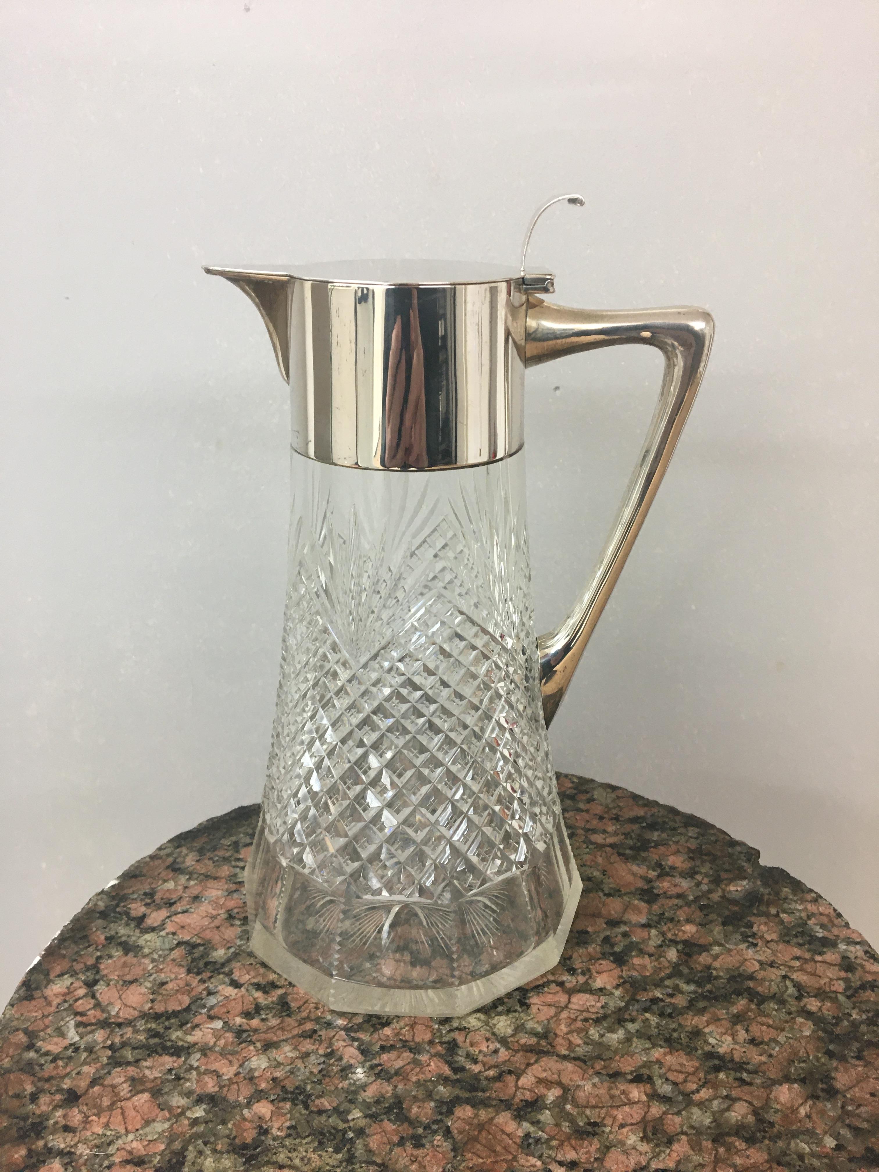 Continental Silver .800 silver topped claret jug maker marked "Gerr Friediander", 26 cm high.