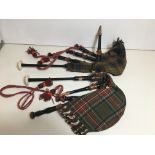 Two sets of bagpipes.