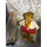 Box of vintage dolls, a bear with hump back and gr