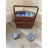 Chinese ceramic lidded boxes and carrier handled c