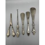 HM Silver shoe horns, button hooks and glove stret