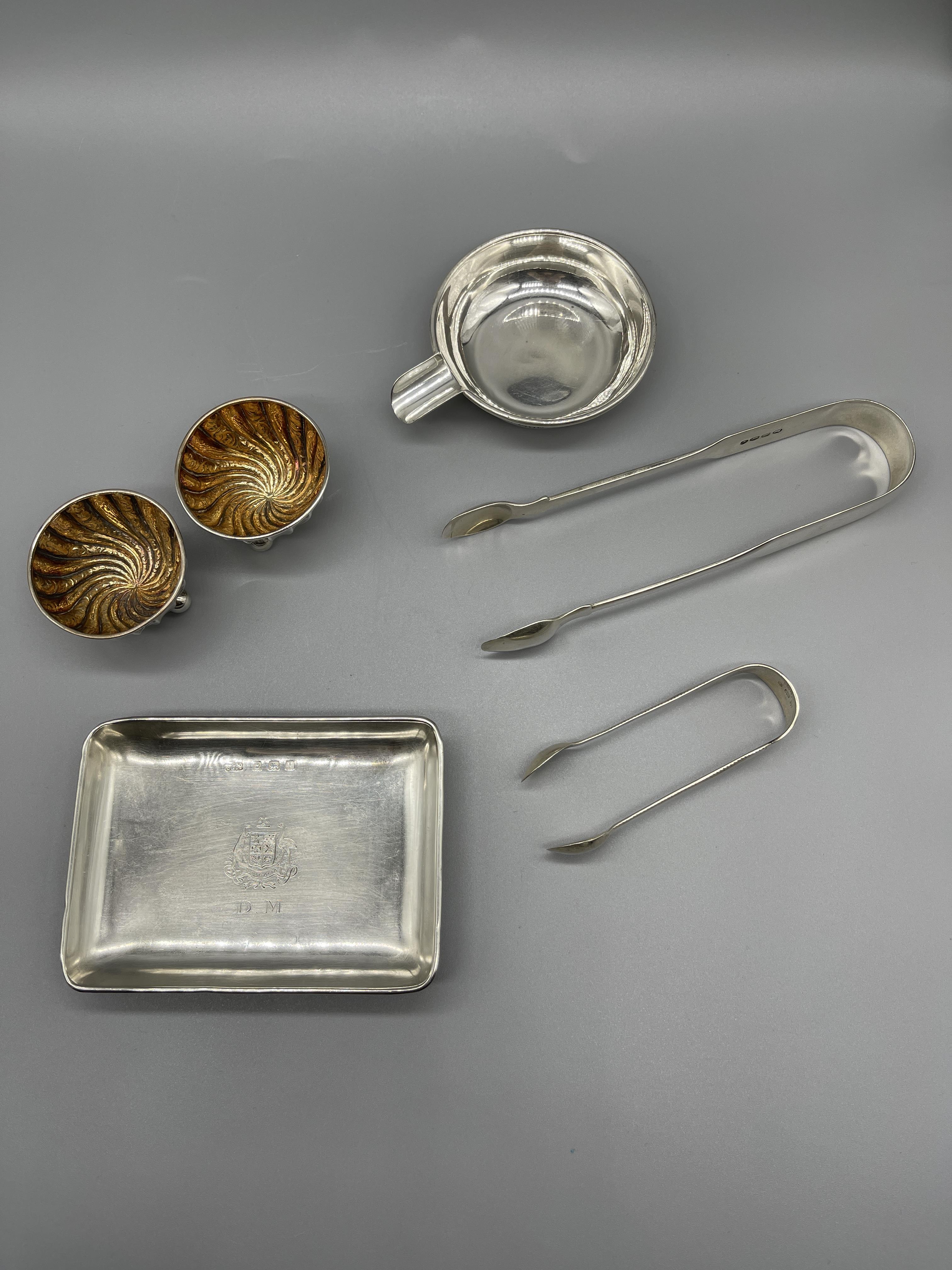 Two HM Silver ashtrays, salts and snips.160 G