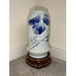 Art Nouveau Chinese vase on the wooden stand.