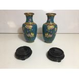 Pair of Chinese cloisonne vases.height 20.5 cm and