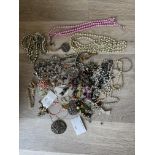 Qty dress Jeweller, brooches, necklaces etc.