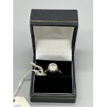 18ct CZ solitaire ring. 18mm inner diameter.