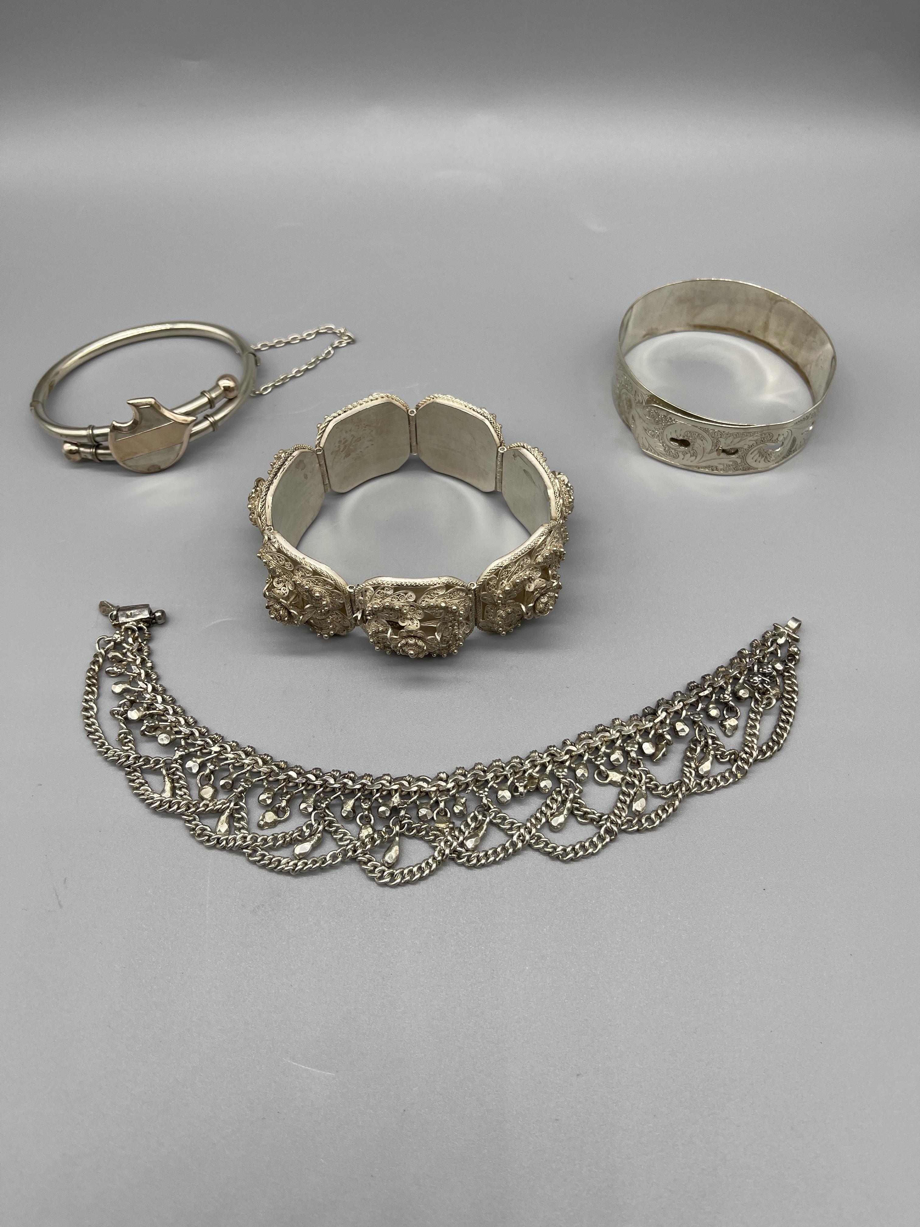 Four vintage Silver bracelets.137 G