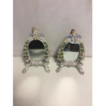 Pair of Meissen style mirrors with cherubs