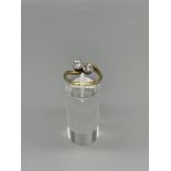 18 ct Diamond crossover ring, two old brilliant cu