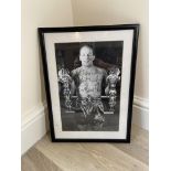 Autographed Photo of Sir Henry Cooper holding his