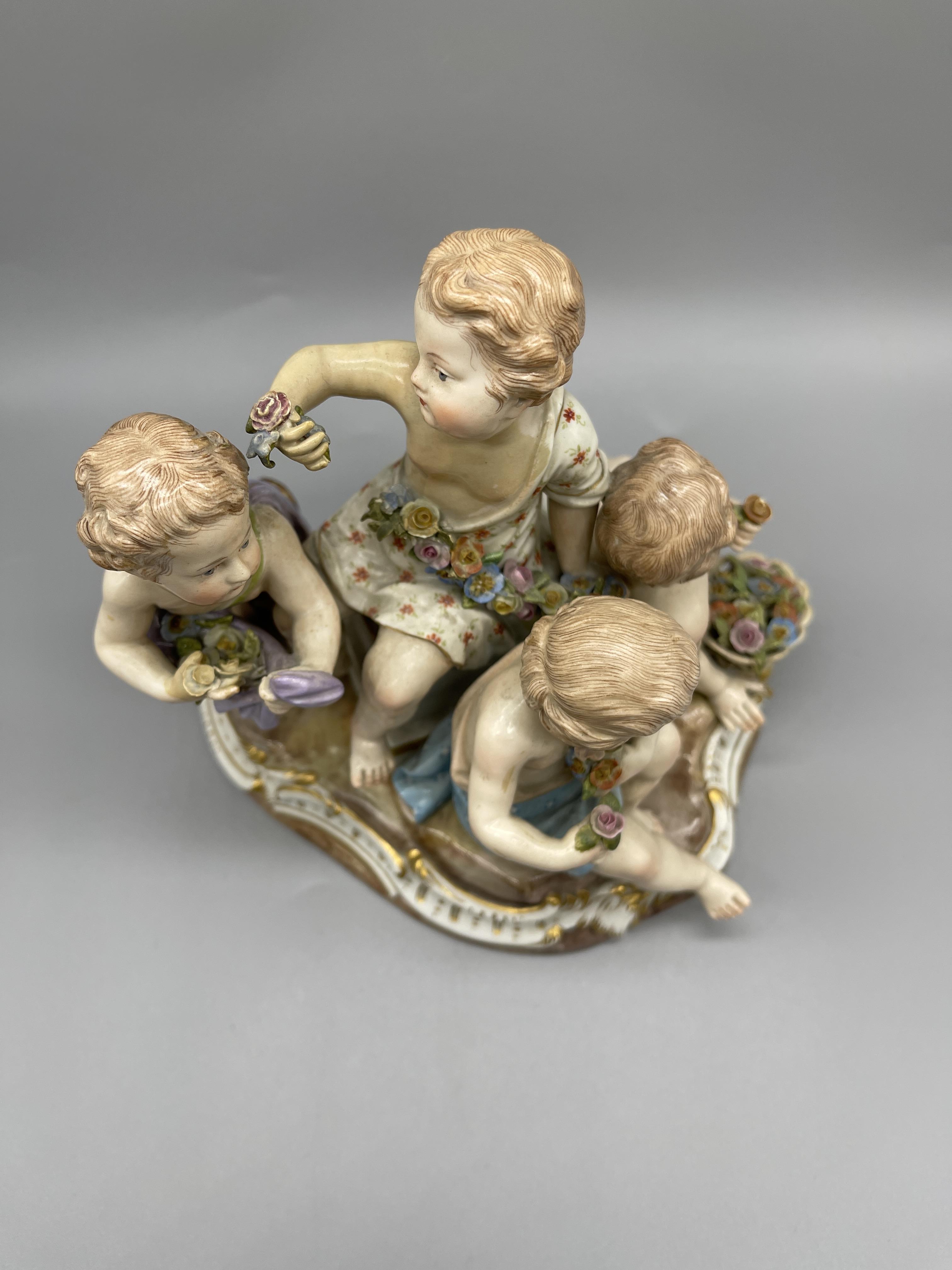 19th C Meissen group of four children holding flow - Image 9 of 9