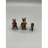 Three Cold painted viennes bronze dog band figures