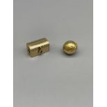 Cartier 14k gold miniature trunk, and gold globe c