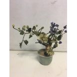 An oriental hardstone flowering bush in ceramic po