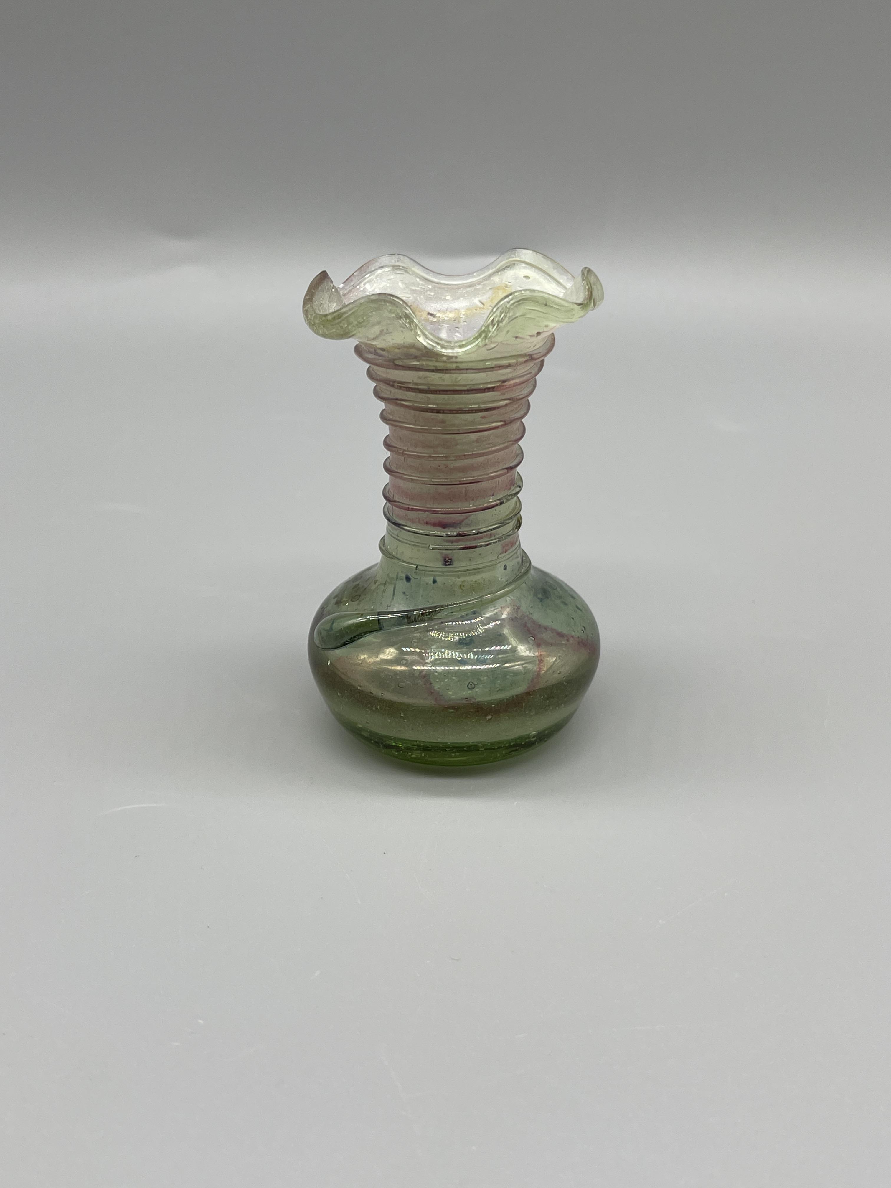 Small Roman Glass Style Vase. Approximately 2inche