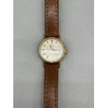 Ladies Omega Quartz wristwatch on leather strap.