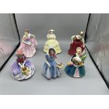 Six Medium sized lady figurines by Royal Doulton,