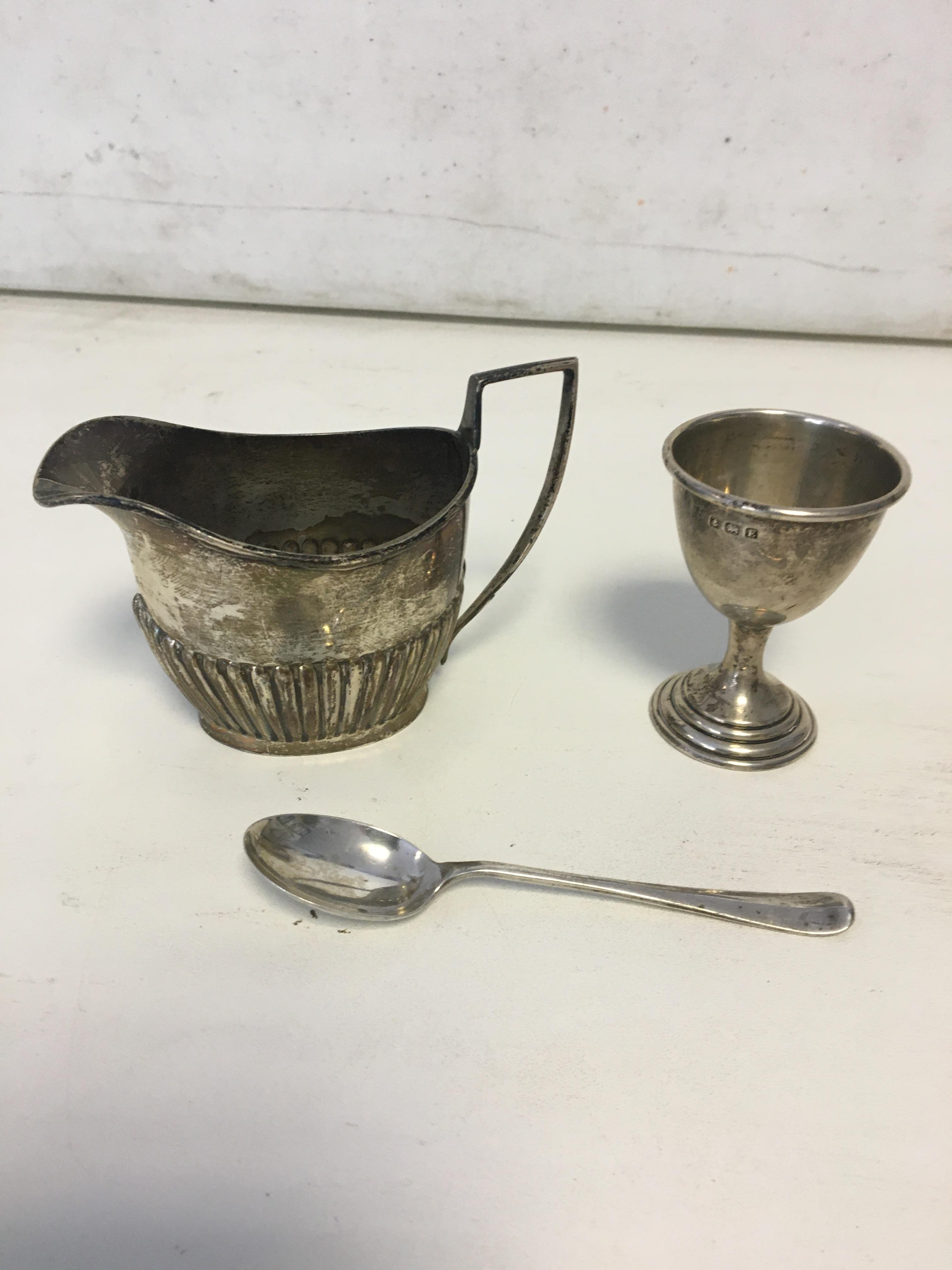 HM Silver Creamer, egg cup and spoon. Weight 98gr