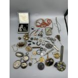 Box of vintage dress jewellery and gold brooches