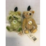 Two Steiff fruit bears with labels and buttons