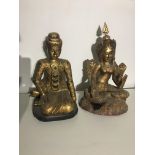 Gilded carved wooden Asian figures