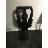 Carved wooden griffin based jardiniere