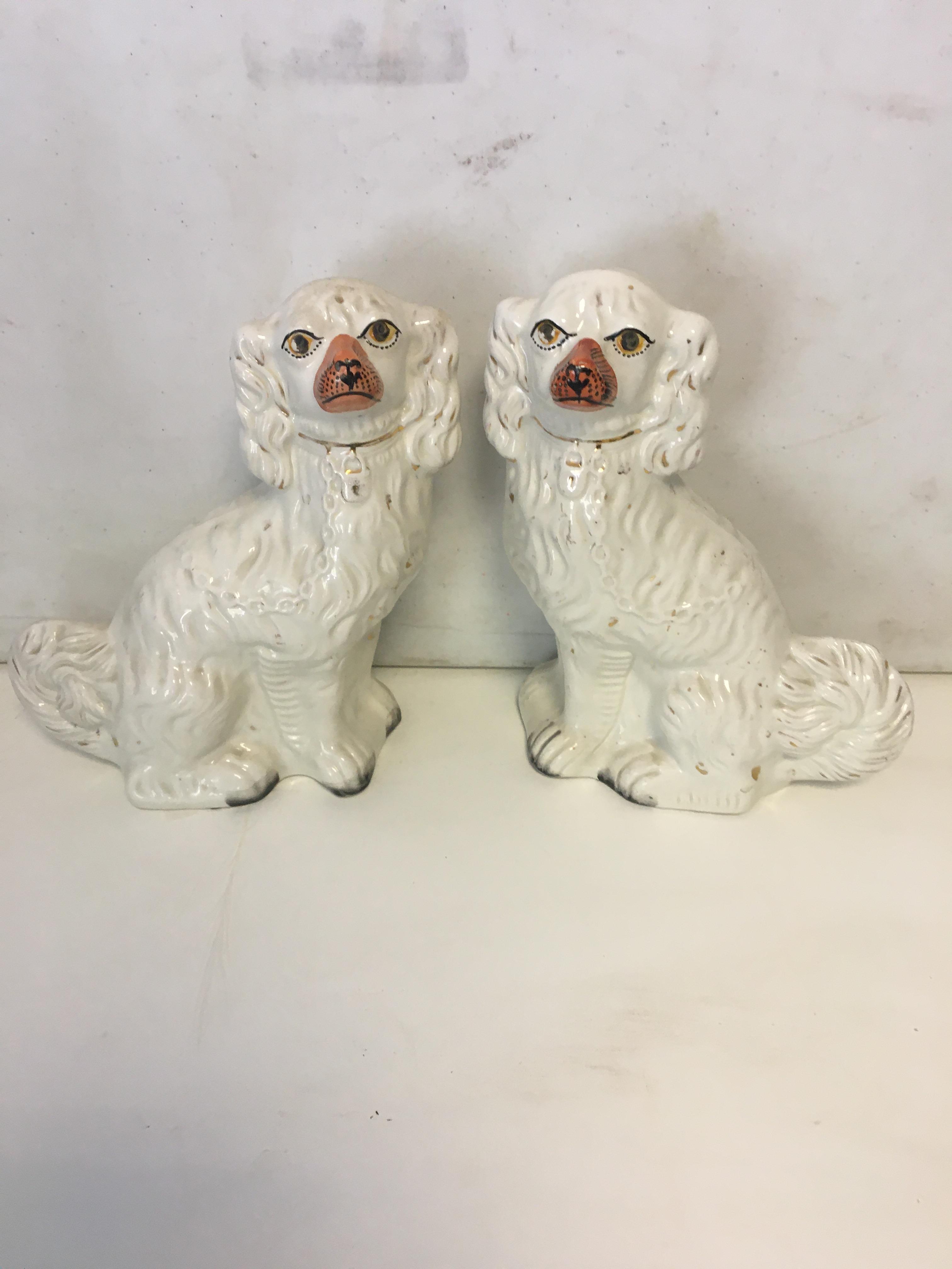 large pair of Staffordshire dogs