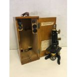 Boxed vintage microscope and lenses