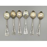 Two HM silver pin trays and spoons.