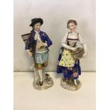 Pair of 19th c ceramic figures marked with a golde