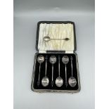 HM Silver cased spoons, knives snips and napkin ri
