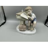 Lladro Boy Asleep on Desk