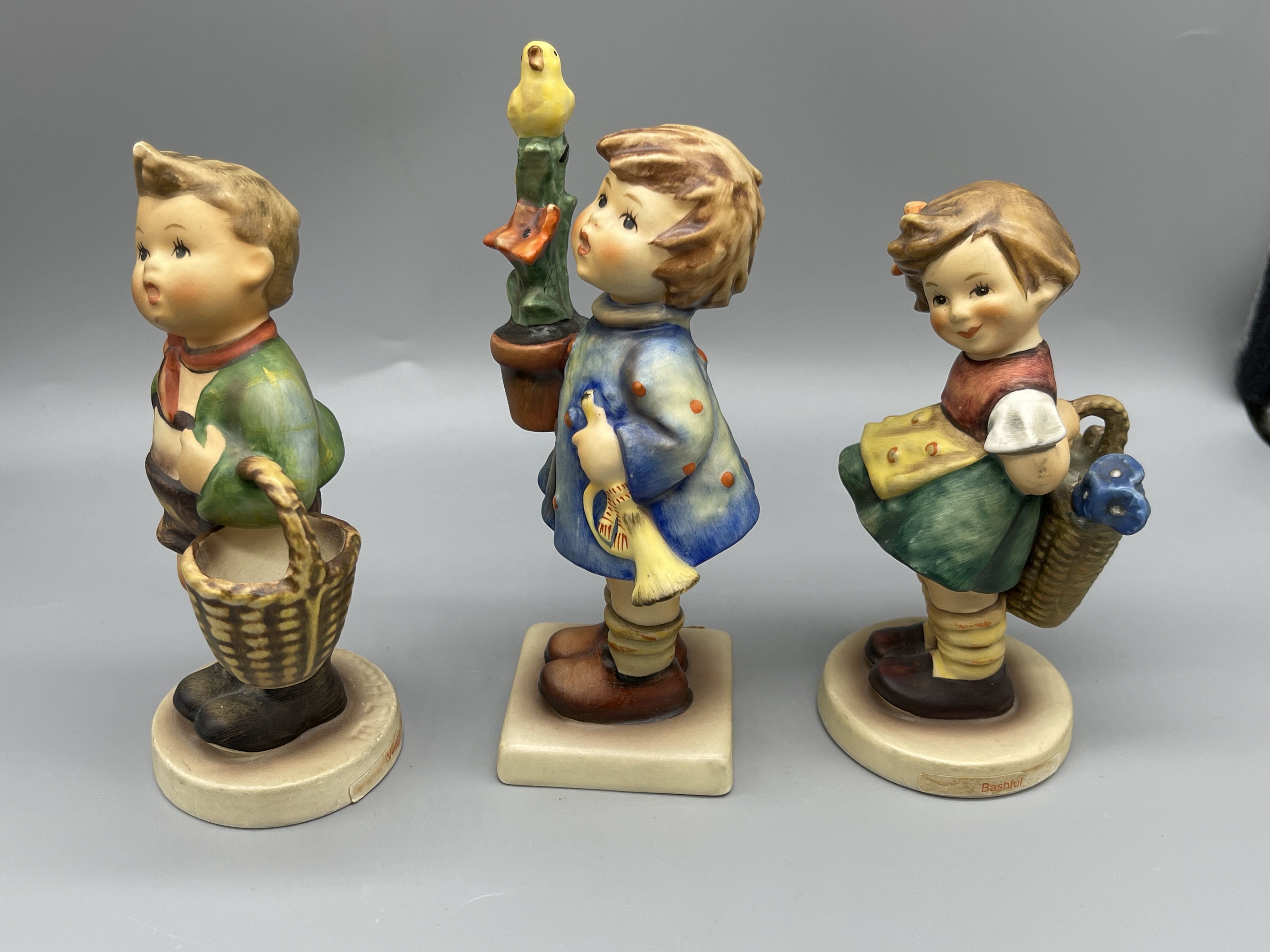 Two Nao figurines and three hummel figurines. - Image 9 of 12