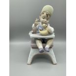 Lladro Boy in High Chair