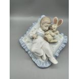 Lladro Baby with Bunny on Bed