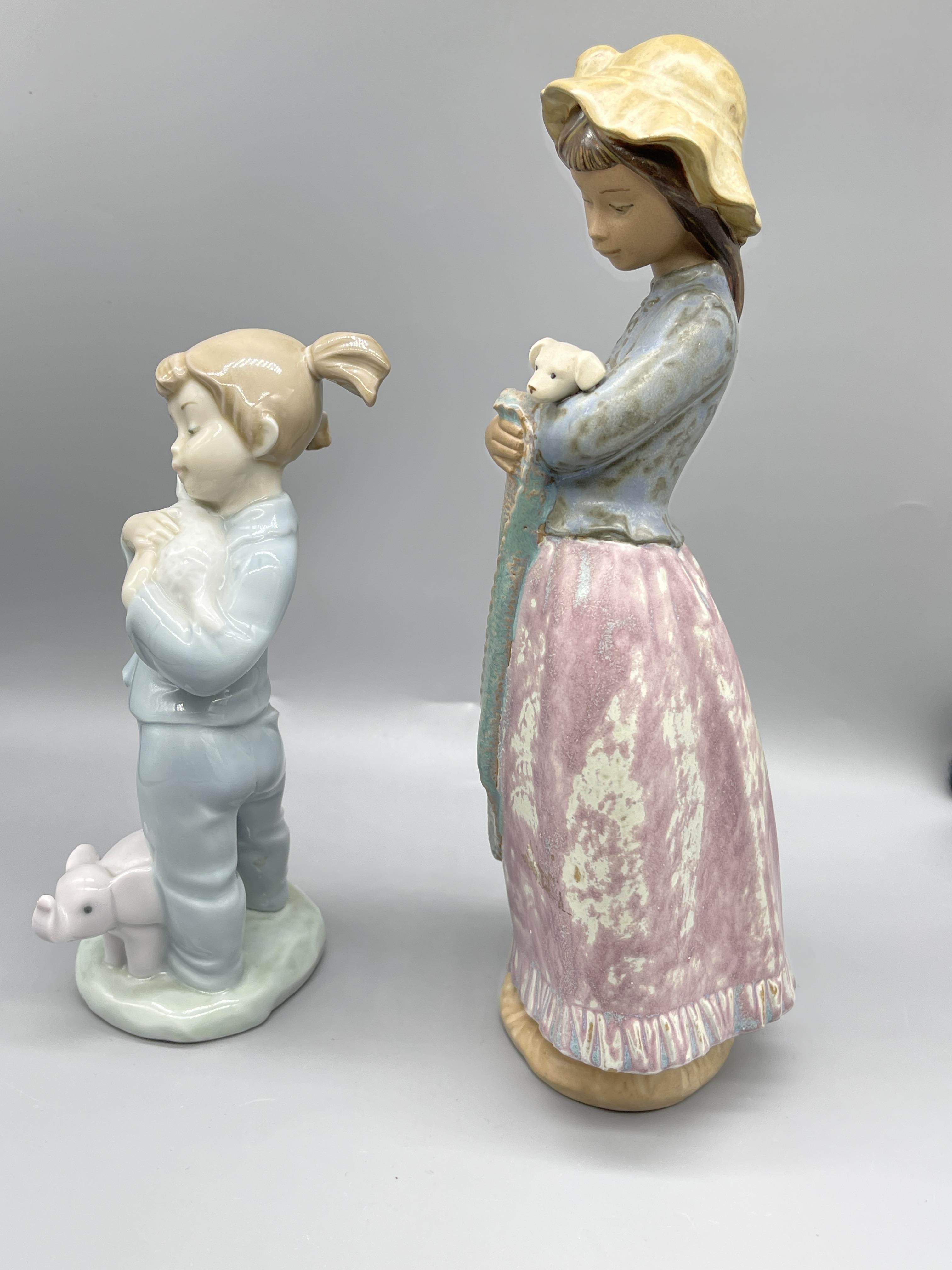 Two Nao figurines and three hummel figurines. - Image 2 of 12