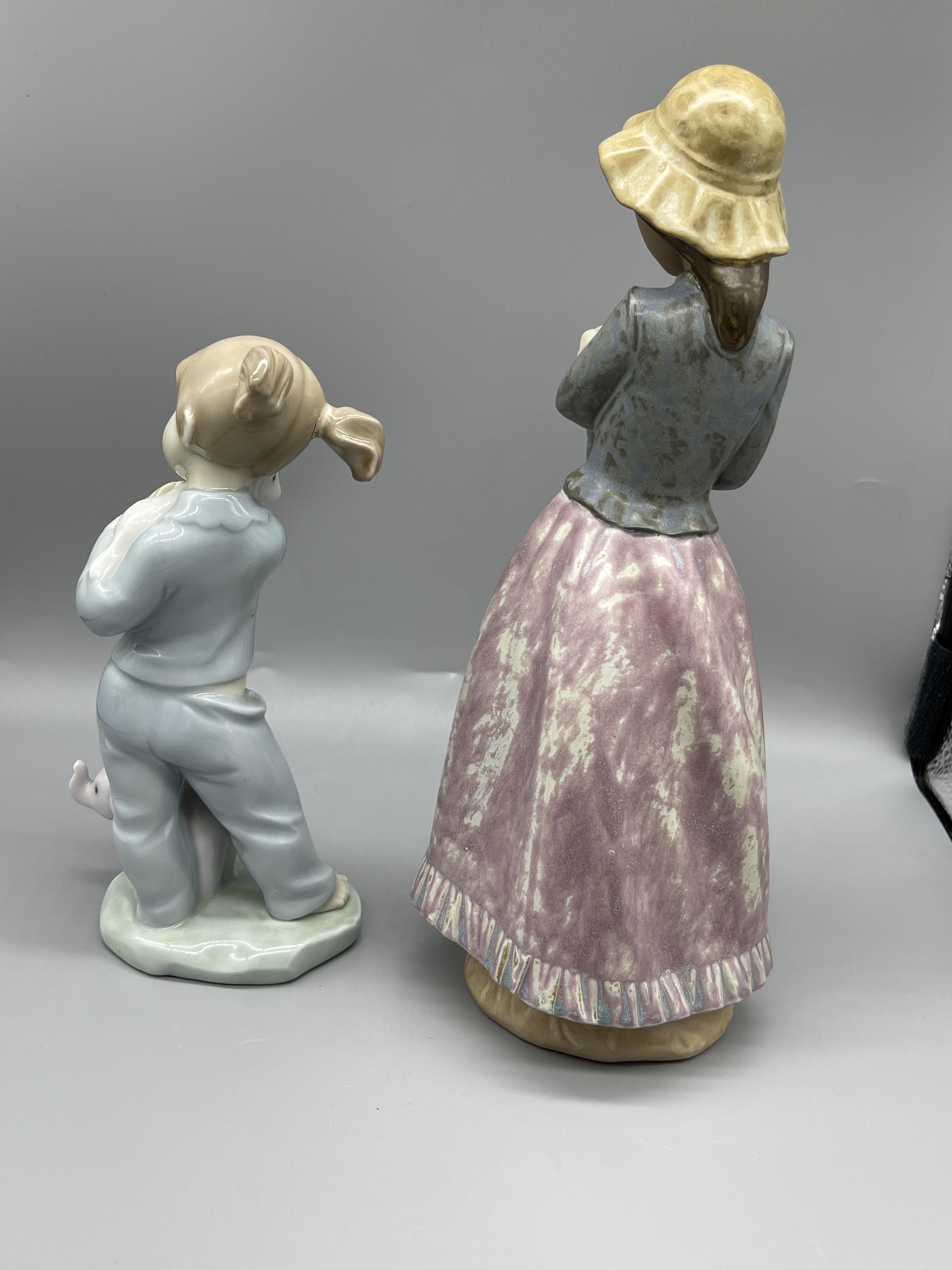 Two Nao figurines and three hummel figurines. - Image 3 of 12