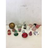 16 glass paperweights.