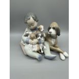 Lladro Boy with Dog and Puppies